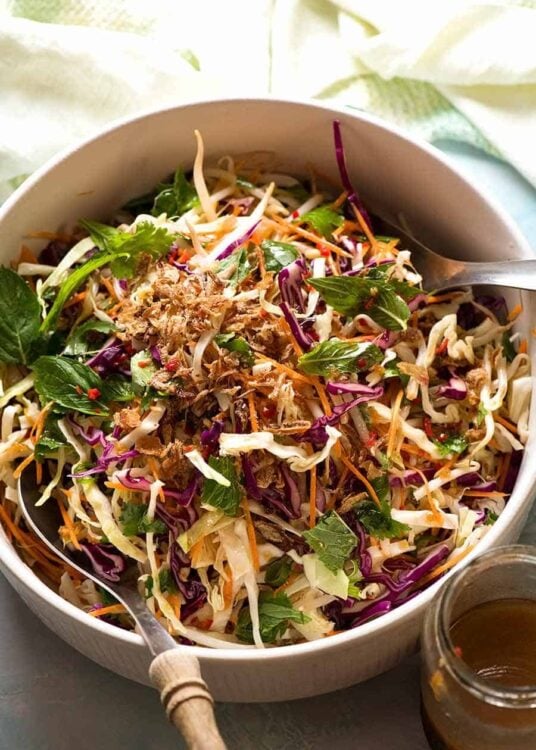 Asian Slaw in a salad bowl with Asian Dressing, ready to be served